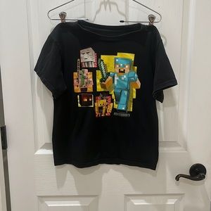Boys Mind Craft 
Gently used 
Shirt 
Size M
10/12
Gently used 
#400A